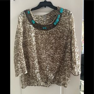 Sheer pullover blouse with beaded neck